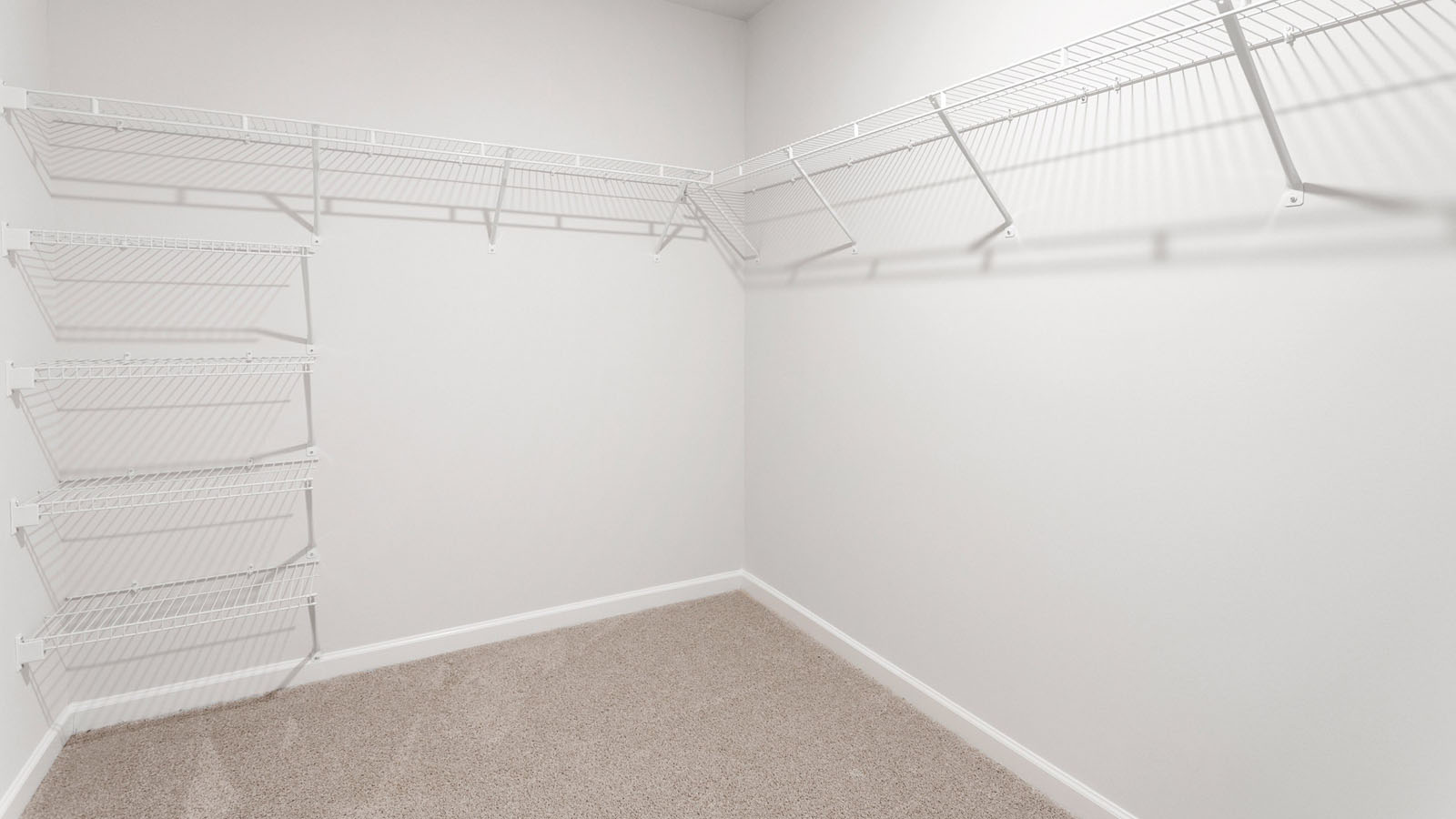 walk in closet with wire shelving