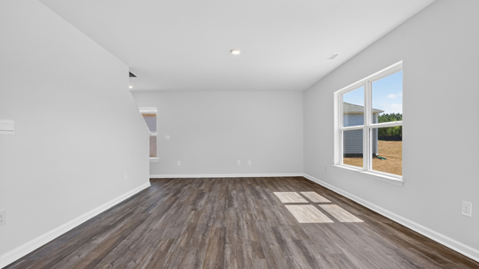 living room with revwood flooring