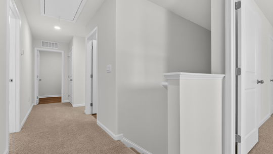 top of stairs with carpet