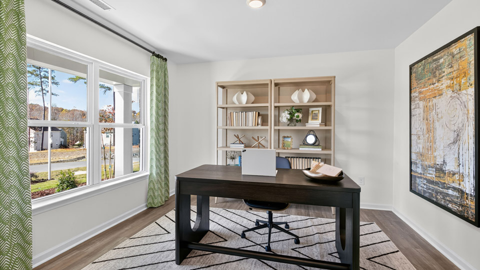 Study room with hardwood floors and big windows