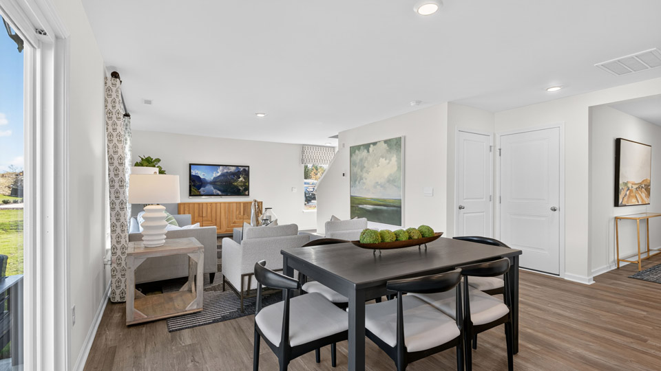 Dining area leading to living room