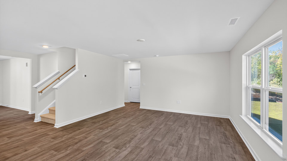 open concept living space with large windows