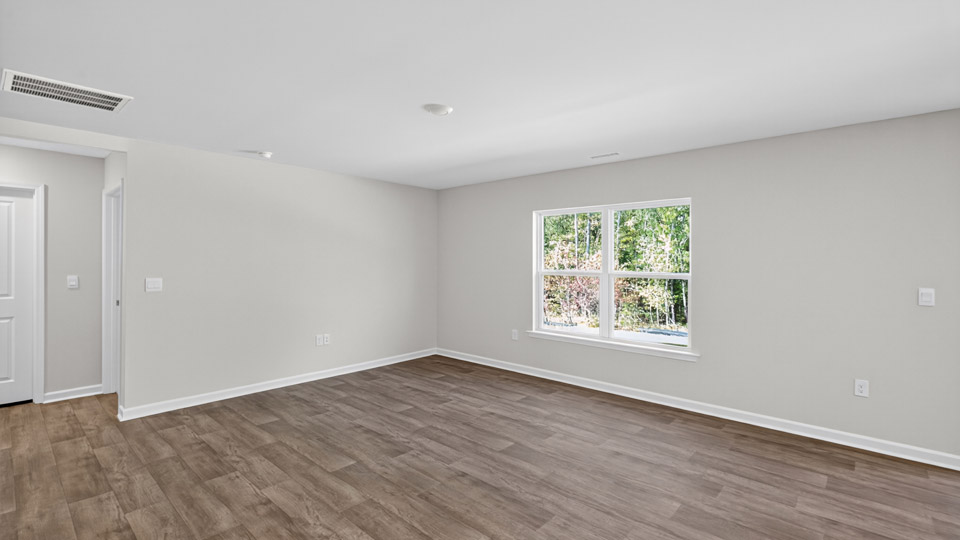 open concept living space with large windows