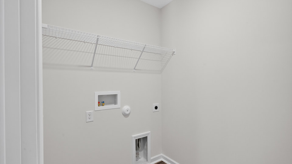 laundry room with wire shelving