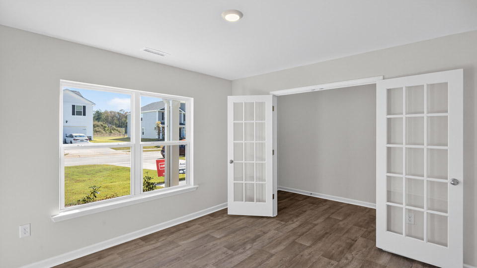 flex room with large windows, french doors