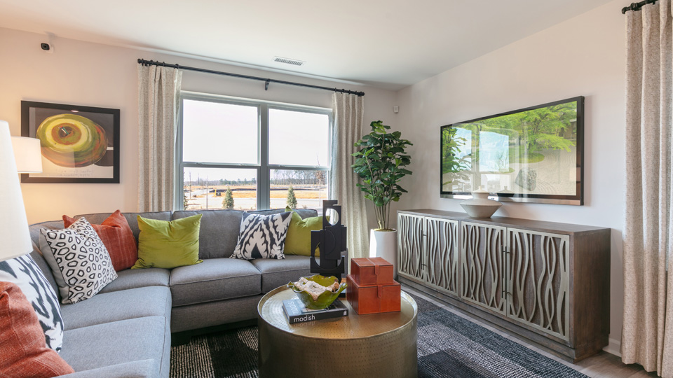 open concept living space with large windows