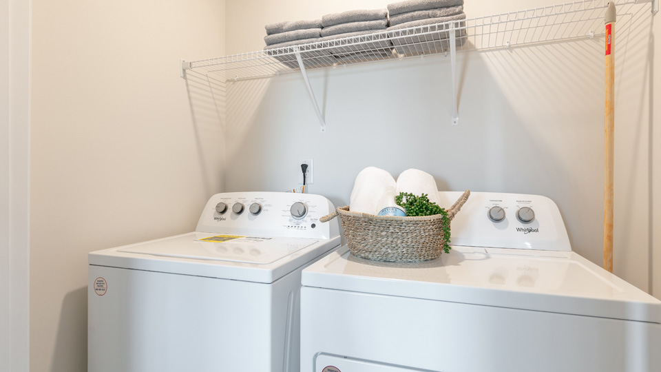 laundry room with wire shelving