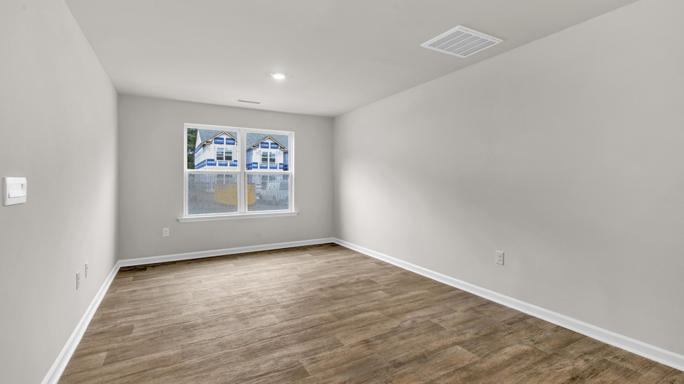 living area with revwood flooring