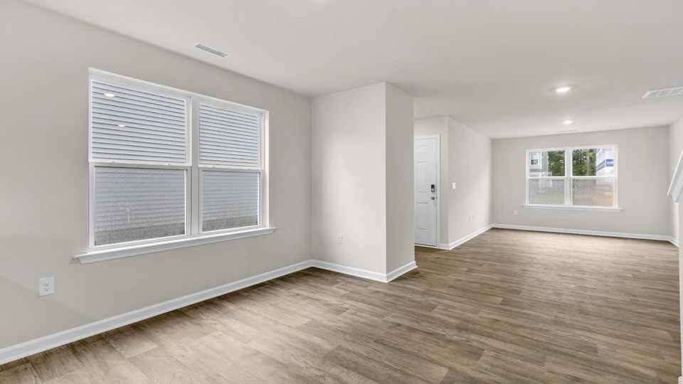 living area with revwood flooring
