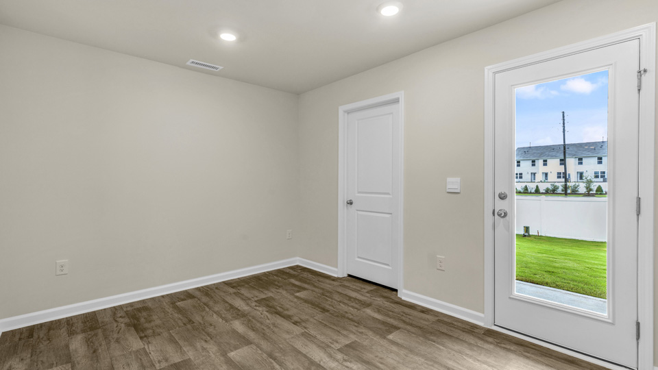 living area with revwood flooring