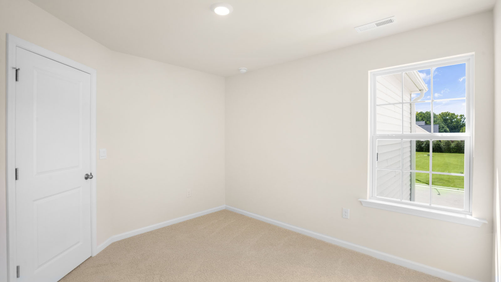 Bedroom with carpet flooring
