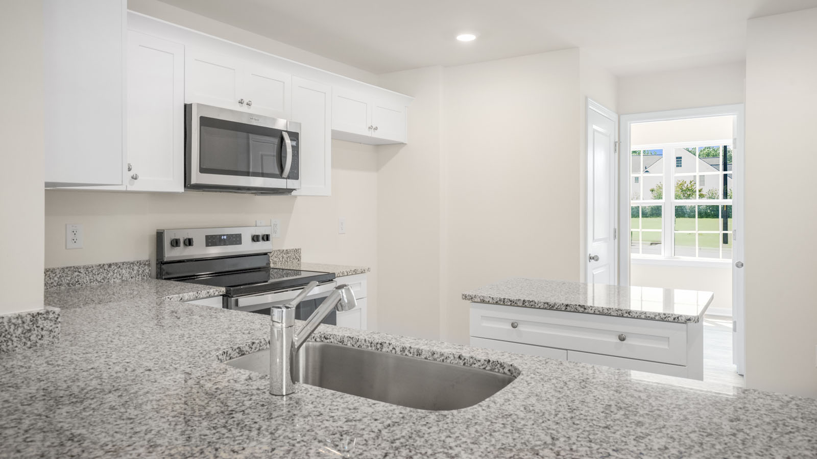 Kitchen with white cabinets