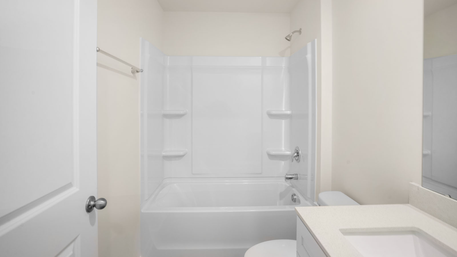 Bathroom with white cabinets