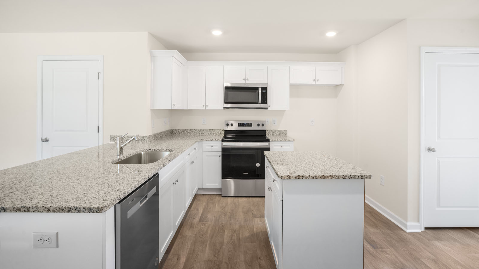 Kitchen with white cabinets