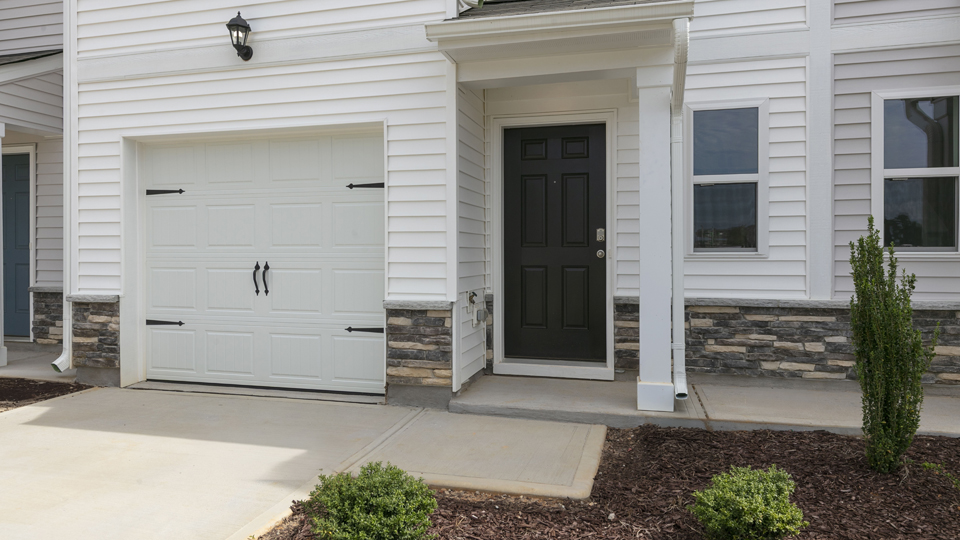 front door and garage door exterior