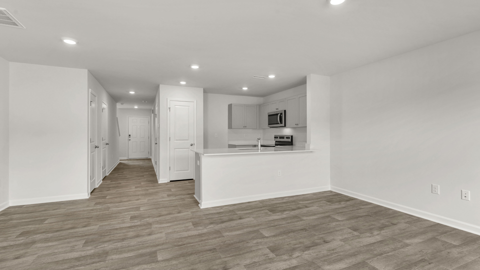 open concept living space with large windows