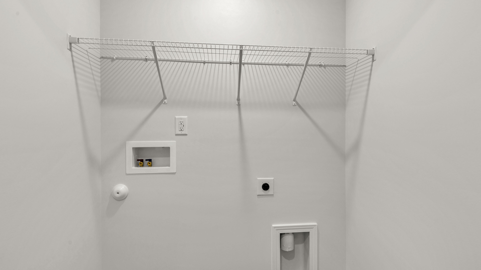 laundry room with wire shelving