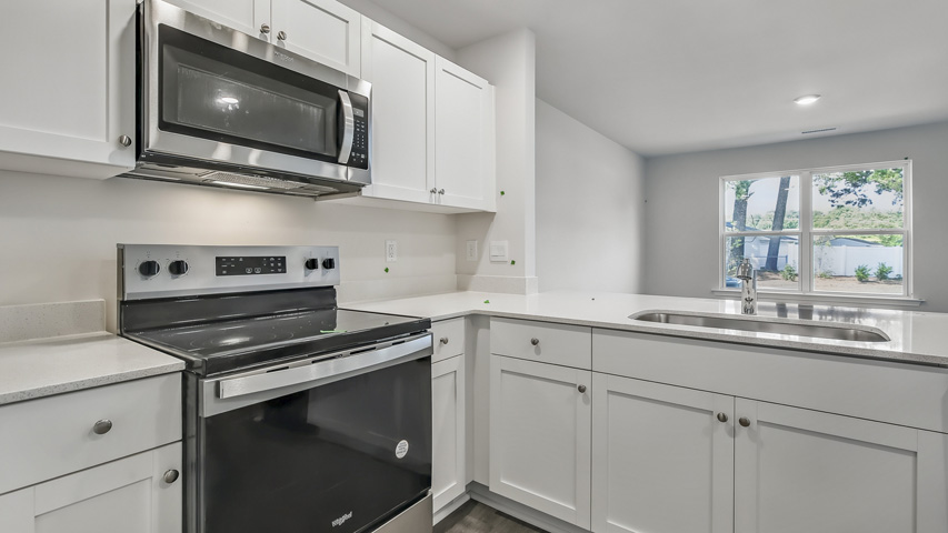 Kitchen with white cabinets