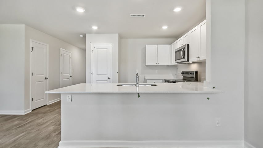 Kitchen with white cabinets