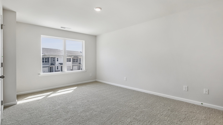 Bedroom with carpet