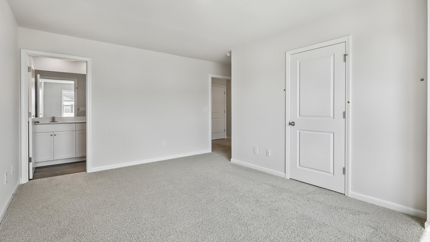Bedroom with carpet
