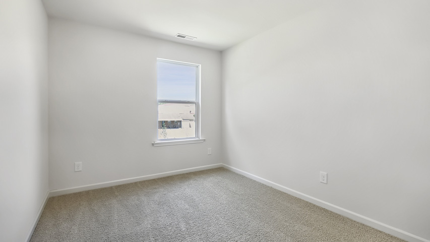 Bedroom with carpet