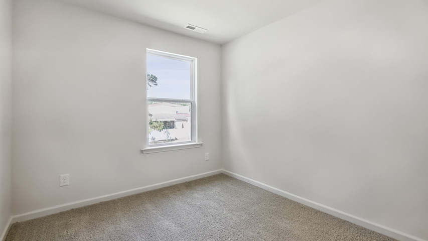 Bedroom with carpet