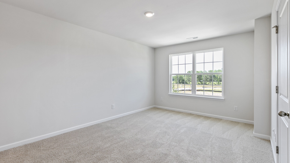 Bedroom with carpet