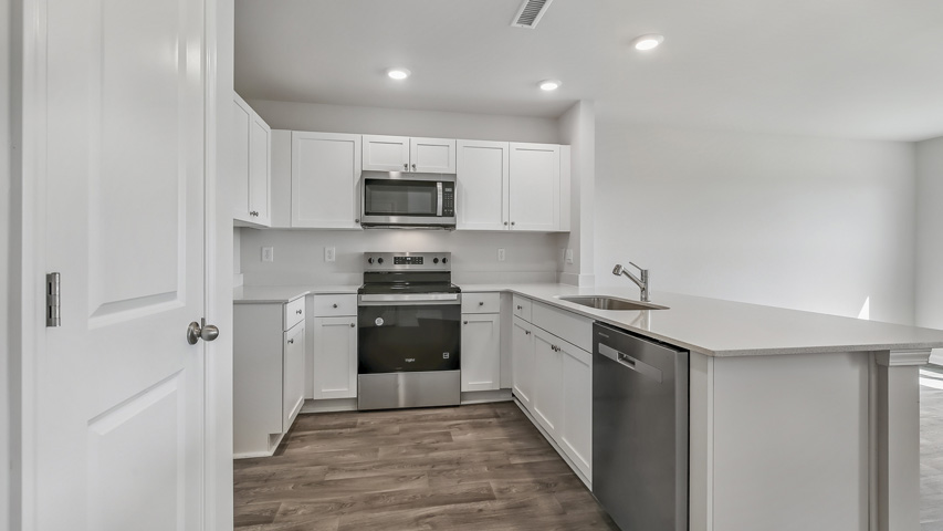 Kitchen with white cabinets