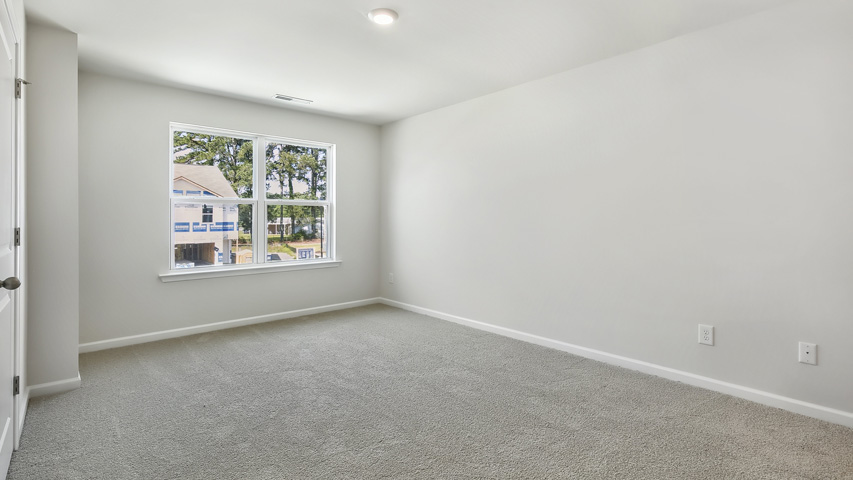 Bedroom with carpet