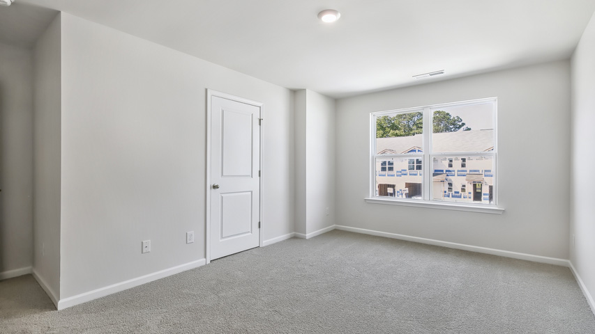 Bedroom with carpet