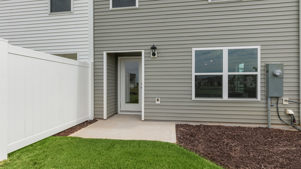 pearson back concrete patio with privacy fence