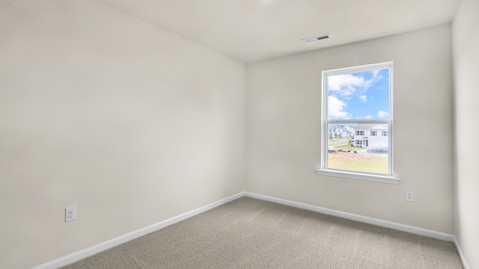 additional bedroom with window, carpeting, closet