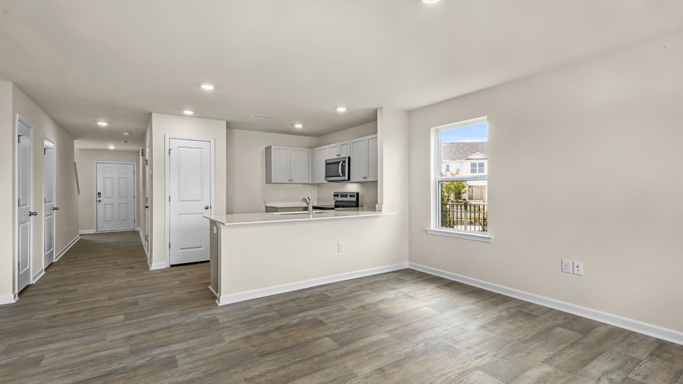 open concept living space with large windows