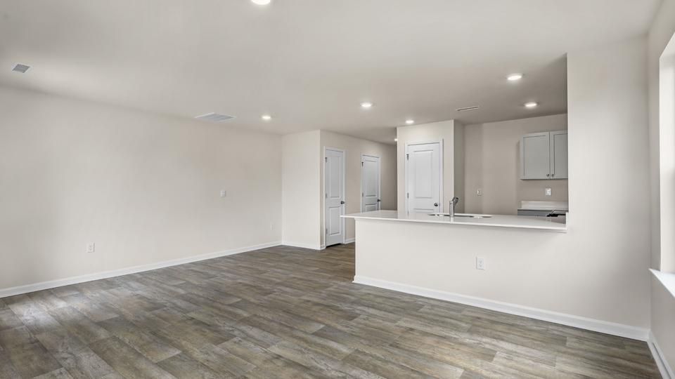 open concept living space with large windows