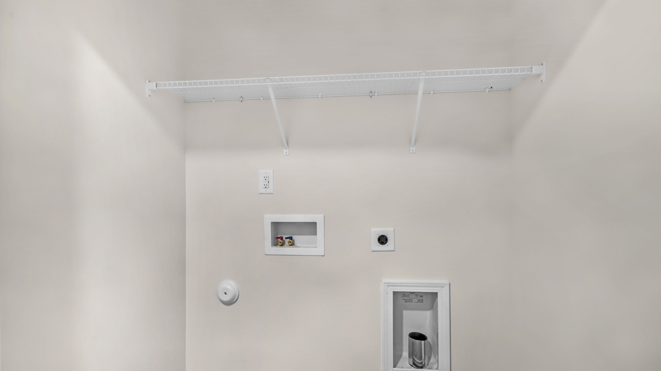 laundry room with wire shelving