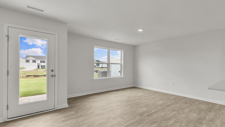 open concept living space with large windows
