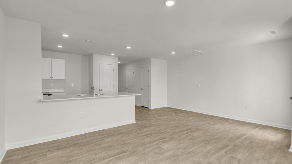 open concept living space with large windows