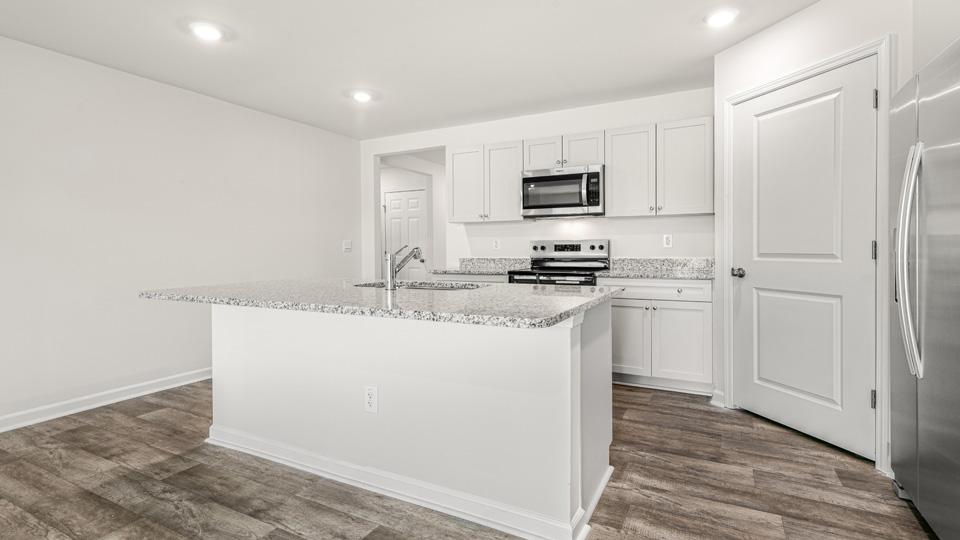 kitchen with white cabinets and stainless steel appliances