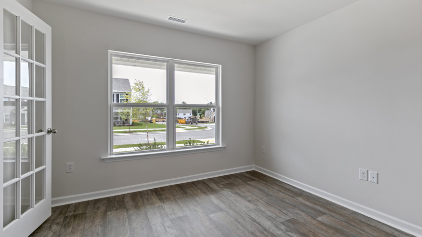 flex room with double windows and lvp flooring