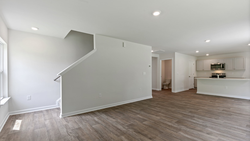 living space with entry to stairs