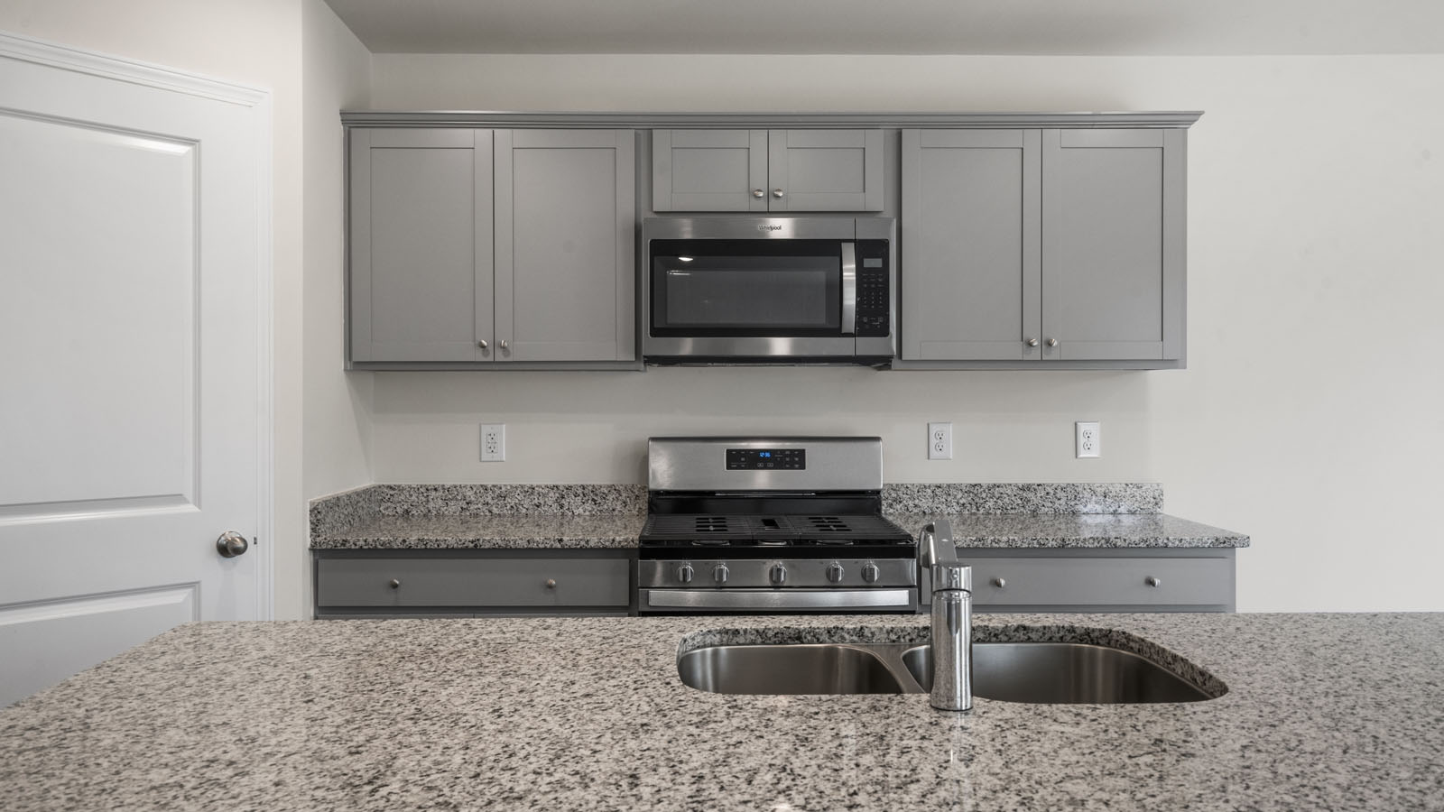 Kitchen with grey cabinets