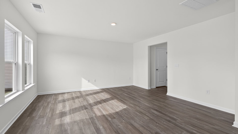 open concept living space with large windows