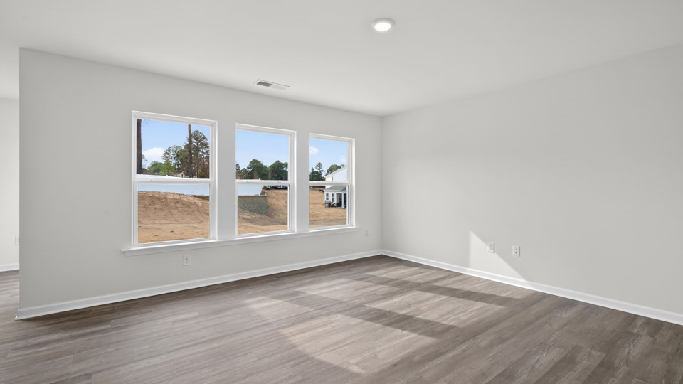 open concept living space with large windows