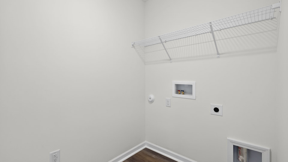 laundry room with wire shelving