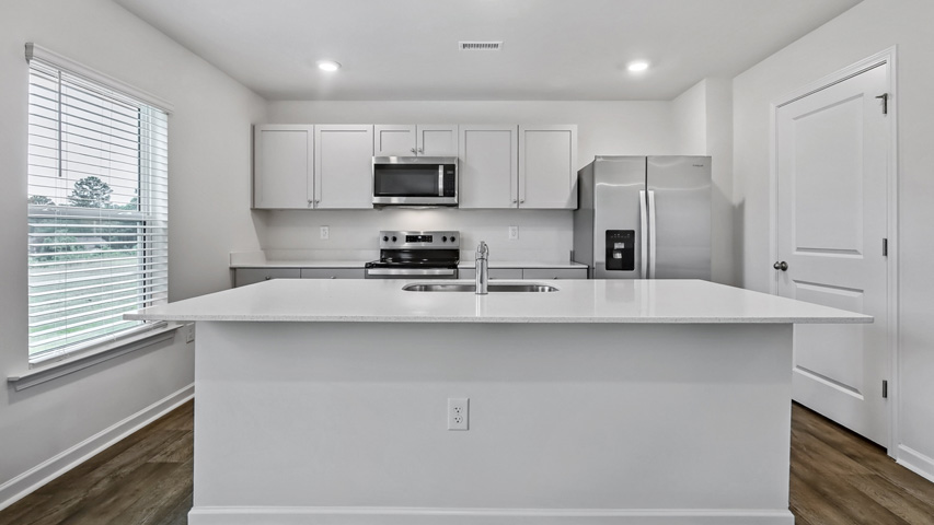Kitchen with white cabinets