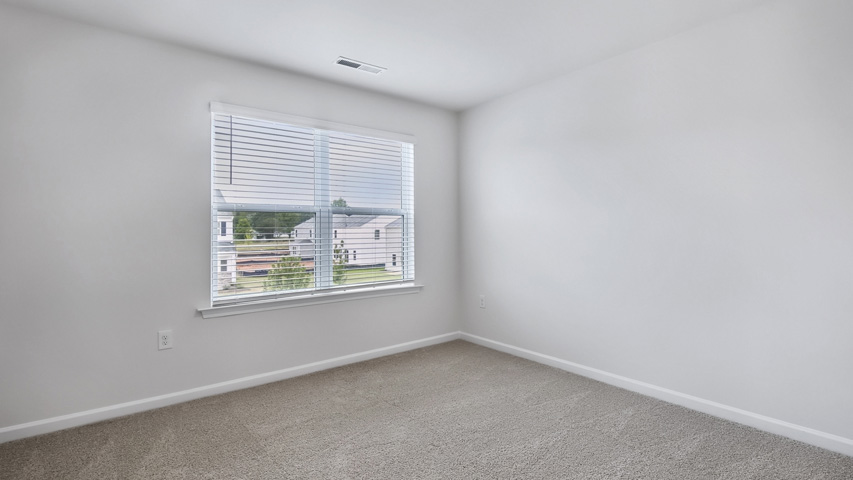 Bedroom with carpet