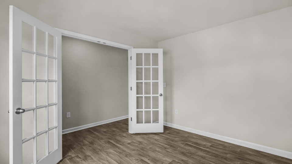 flex room with large windows, french doors