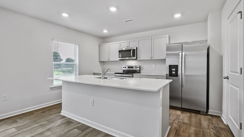 Kitchen with white cabinets