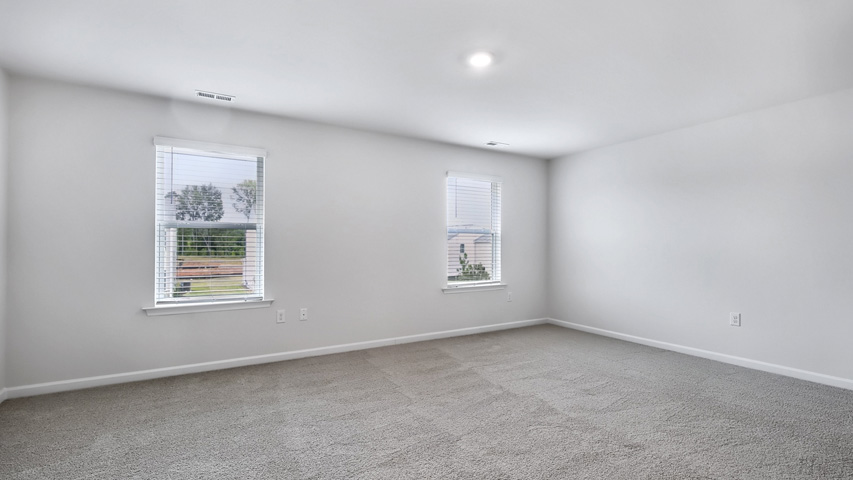 Bedroom with carpet